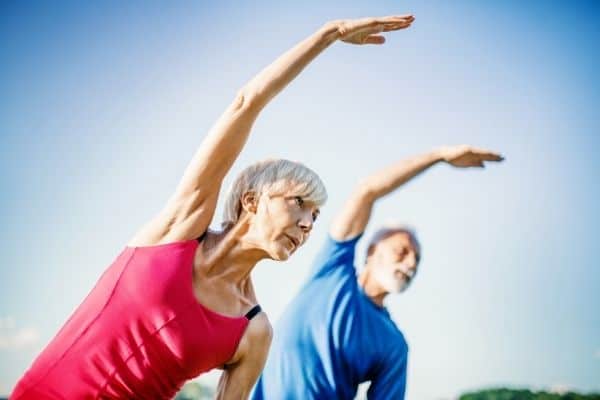 Senior people doing yoga