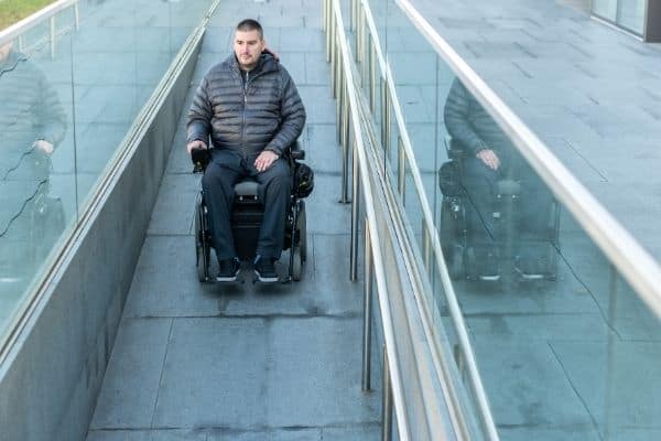 Person outside riding a power wheelchair