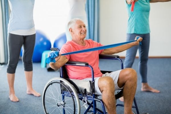 Elderly people doing exercises for seniors